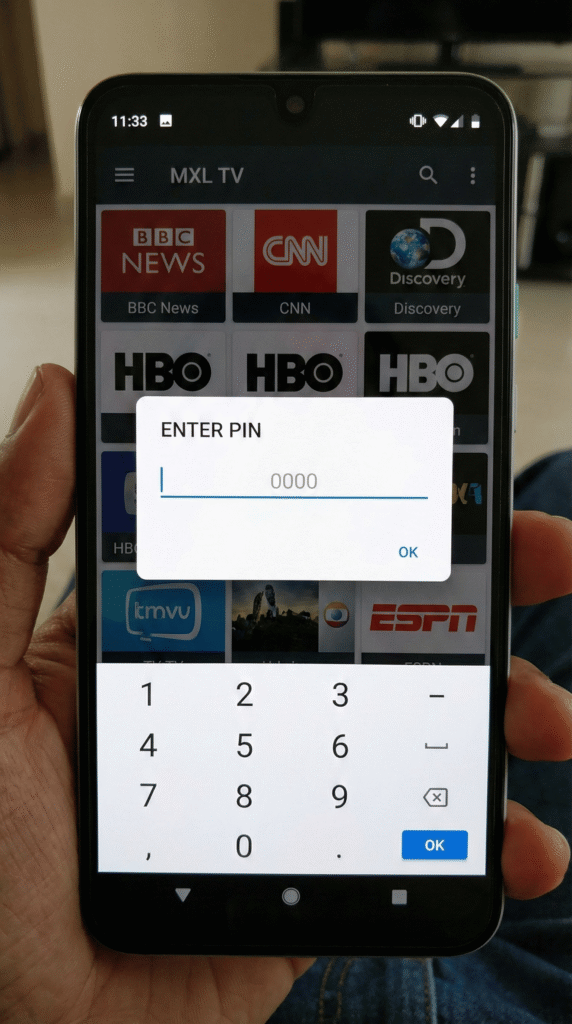 MXL TV app showing a parental control lock screen asking for a 4-digit PIN code.